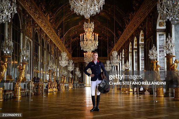 French show jumping rider and Olympic champion Penelope Leprevost poses in the Hall of Mirrors in the Chateau de Versailles , in Versailles,...