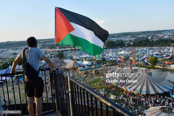 Palestine flag flies from the ribbon tower during day one of Glastonbury Festival 2024 at Worthy Farm, Pilton on June 26, 2024 in Glastonbury,...