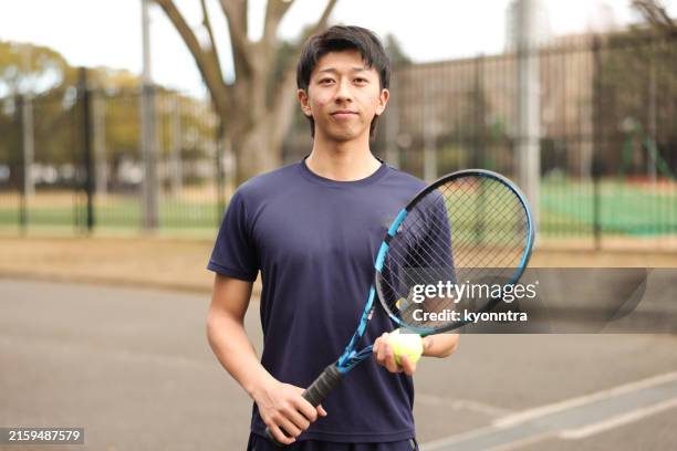 portrait of young asian tennis player - college tennis stock pictures, royalty-free photos & images