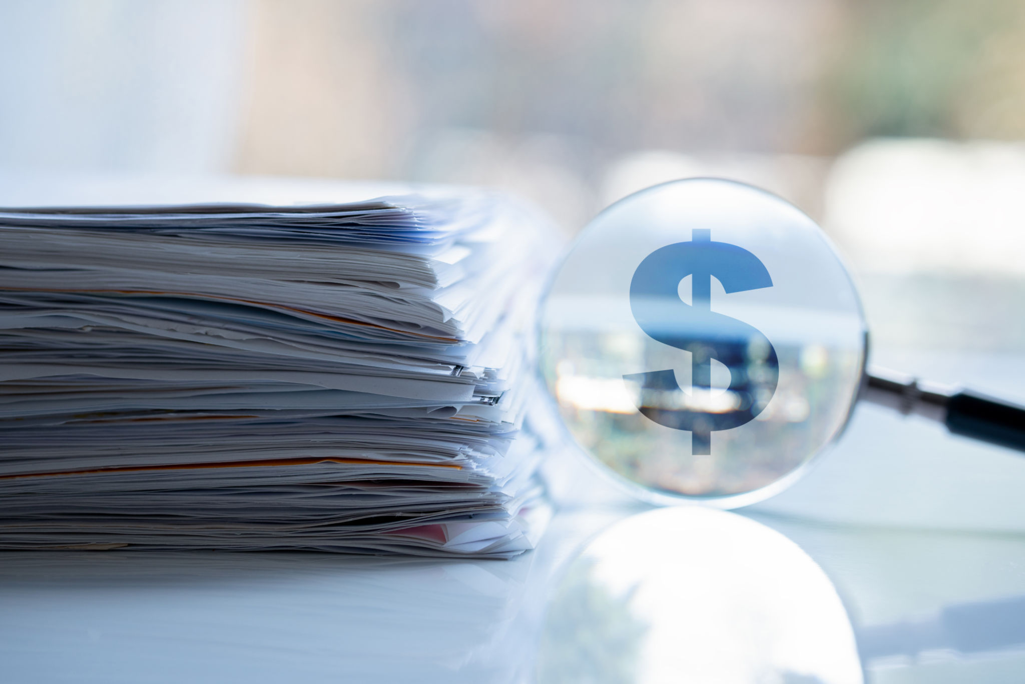 tack of Files and Magnifying Glass – Financial Analysis and Document Management tack of Files and Magnifying Glass – Financial Analysis and Document Management