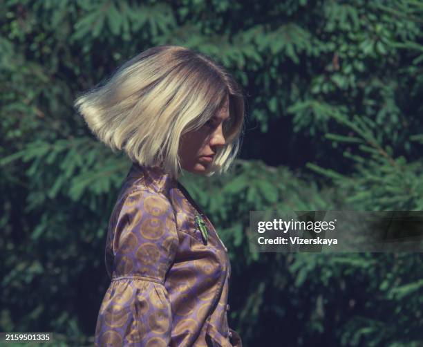 young beautiful woman in action at nature - bobbed hair stock pictures, royalty-free photos & images