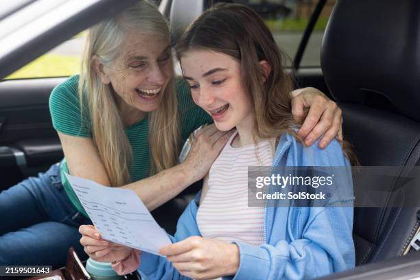 receiving great exam results - celebrating exam results stock pictures, royalty-free photos & images
