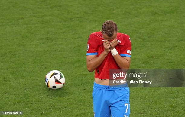 Antonin Barak of Czechia walks off after being shown a red card, after a second yellow during the UEFA EURO 2024 group stage match between Czechia...