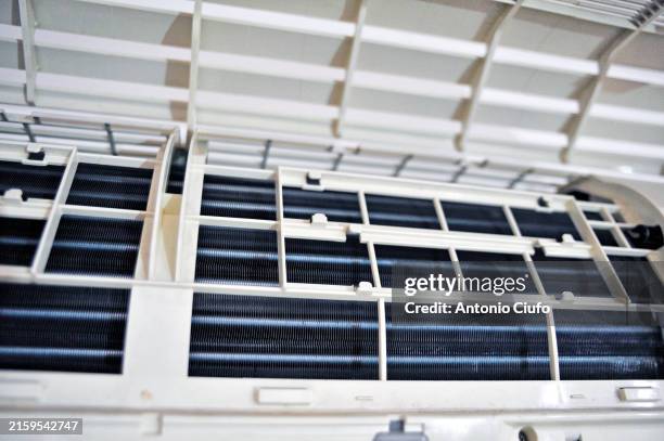 installation and cleaning phase of a home air-conditioning system, italy - respiratory protection construction stock pictures, royalty-free photos & images