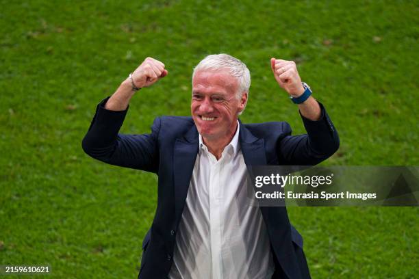 France Head Coach Didier Deschamps celebrates with his teammates after winning Belgium during the UEFA EURO 2024 round of 16 match between France and...