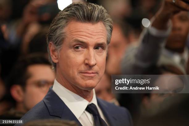 Gov. Gavin Newsom speaks to reporters in the spin room following the CNN Presidential Debate between U.S. President Joe Biden and Republican...