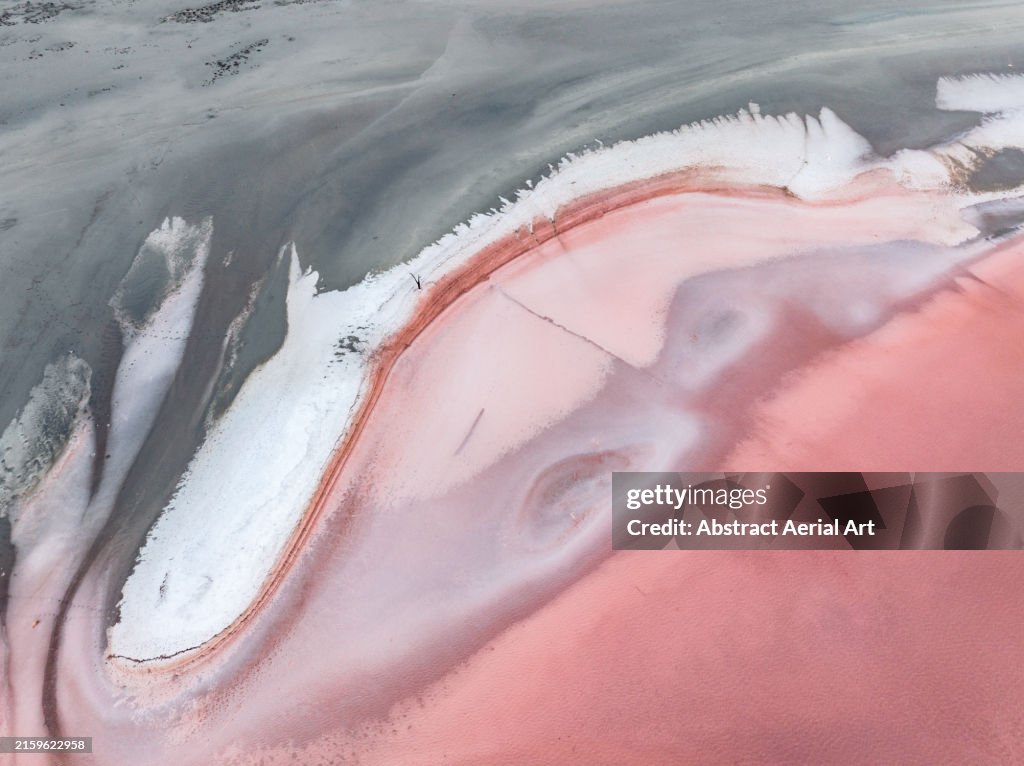 Drone photograph showing a majestic pink coloured salt lake, Western Australia, Australia