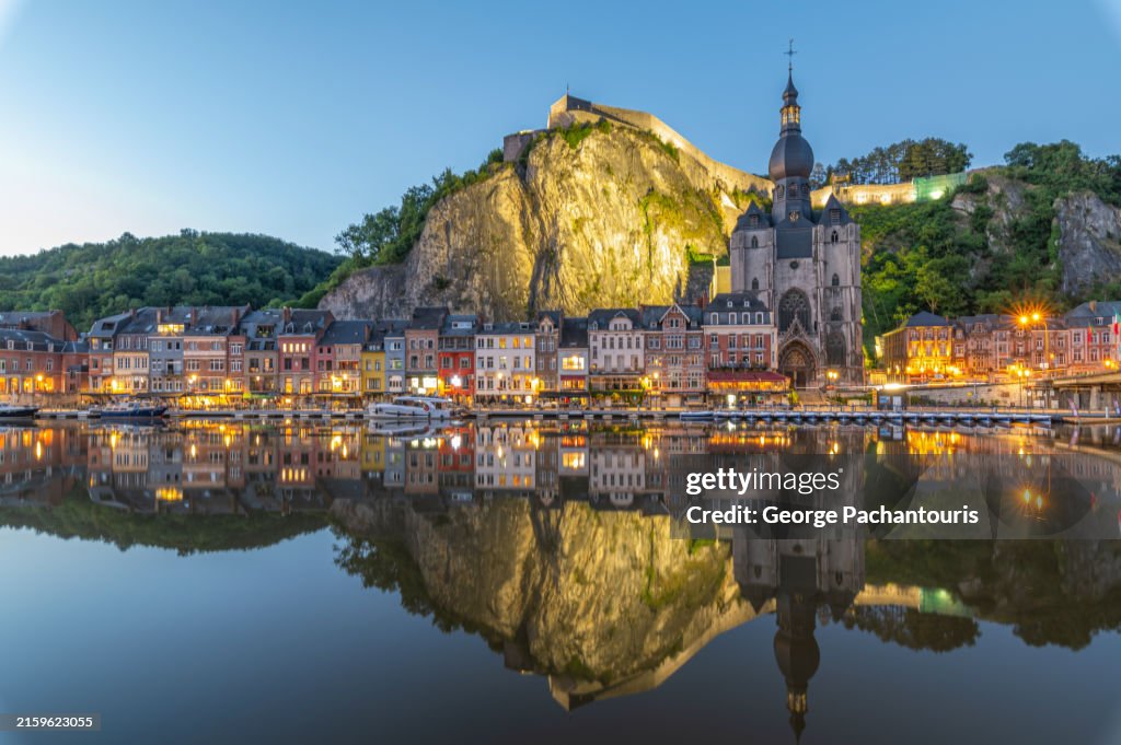 Dinant reflection on river Meuse, Belgium