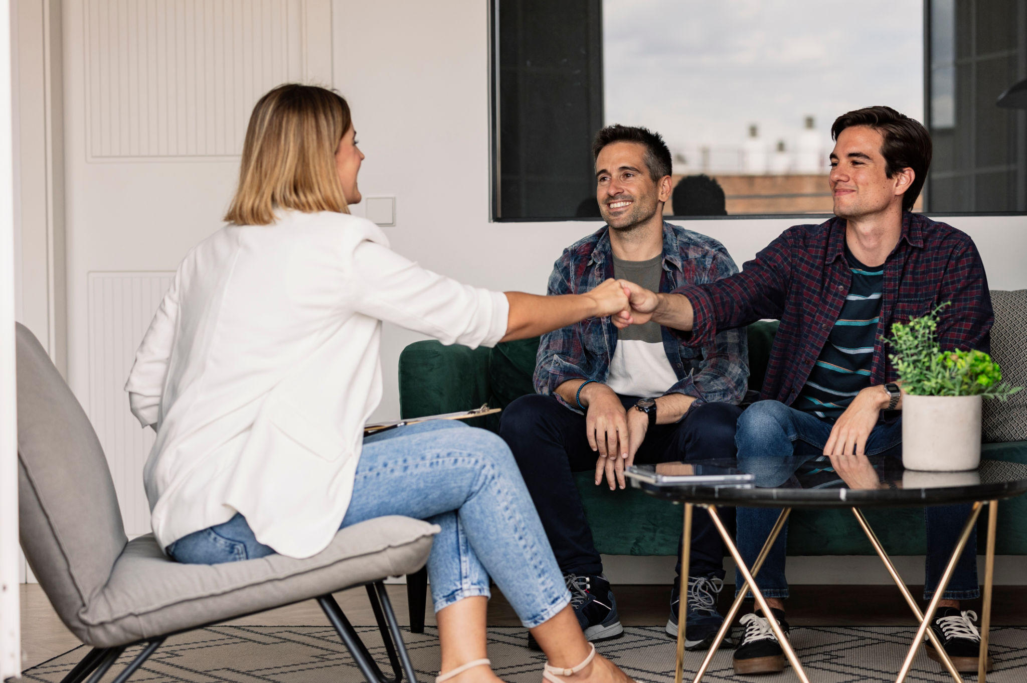 Gay Couple Meeting Real Estate Agent for New Home Purchase Gay Couple Meeting Real Estate Agent for New Home Purchase
