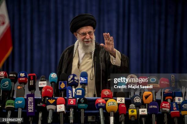 Iran's Supreme Leader Ayatollah Ali Khamenei seen as he casts his vote for the snap presidential election at the Imam Khomeini Husseiniya on June 28,...