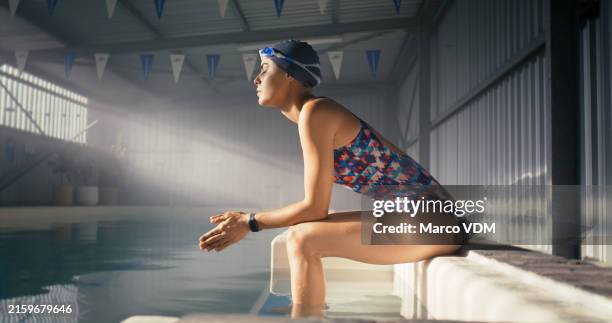 woman, exercise and thinking by swimming pool for wellness, training plan or idea for health. female person, stadium and feet in water with contemplation for workout, thoughtful in profile with hands - freedom aquatic and fitness center stock pictures, royalty-free photos & images