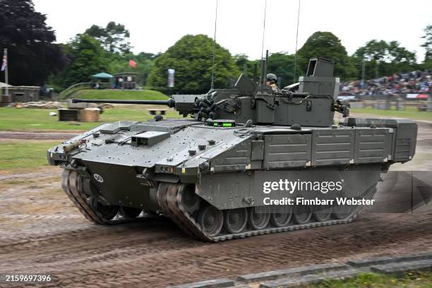 The first public running display of the British Army Ajax armoured vehicle takes place at TANKFEST 2024 at The Tank Museum, on June 28, 2024 in...