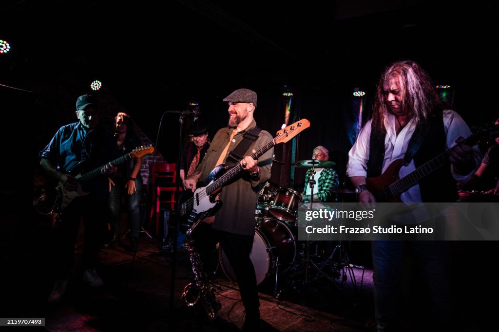 Band of friends performing at a nightclub