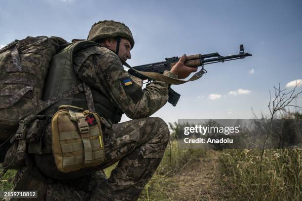Infantrymen training with a T-80 tank are seen as the war between Russia and Ukraine continues in Donetsk Oblast, Ukraine on July 02, 2024. The T-80...