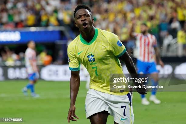 Vinicius Junior of Brazil celebrates after scoring the team's first goal during the CONMEBOL Copa America 2024 Group D match between Paraguay and...