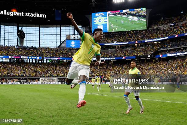 Vinicius Junior of Brazil celebrates after scoring the team's first goal during the CONMEBOL Copa America 2024 Group D match between Paraguay and...