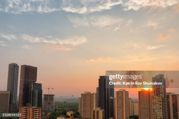 sunny rain in sunrise city - toronto skyline silhouette stock pictures, royalty-free photos & images