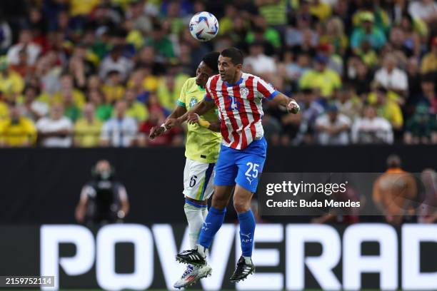 Wendell of Brazil challenges for the ball with Gustavo Velazquez of Paraguay during the CONMEBOL Copa America 2024 Group D match between Paraguay and...