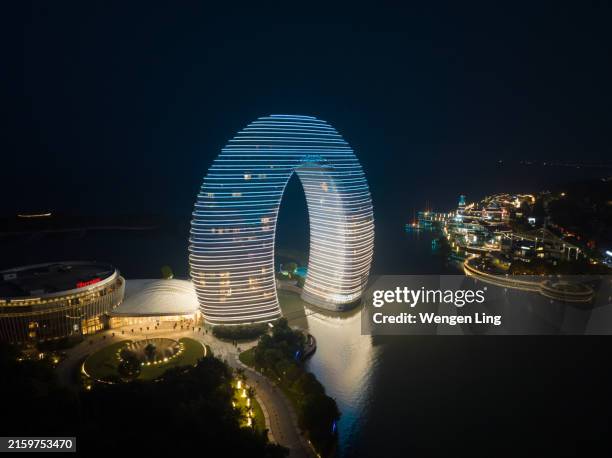 night view of sheraton taihu hot spring resort - huzhou stock pictures, royalty-free photos & images