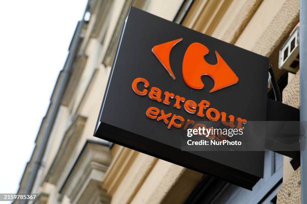 The Carrefour Express logo is being seen on the street in Krakow, Poland, on June 11, 2024.