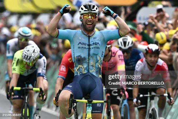 Astana Qazaqstan Team's British rider Mark Cavendish cycles to the finish line to win the 5th stage of the 111th edition of the Tour de France...