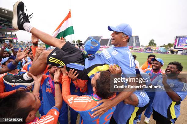 Rahul Dravid Head Coach of India is lifted up by the team after India won the ICC Men's T20 Cricket World Cup West Indies & USA 2024 Final match...
