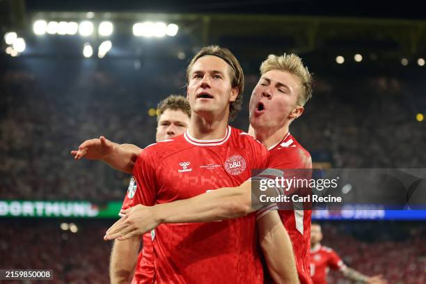 Joachim Andersen of Denmark celebrates scoring his team's first goal with teammate Rasmus Hojlund which is later disallowed for offside following a...