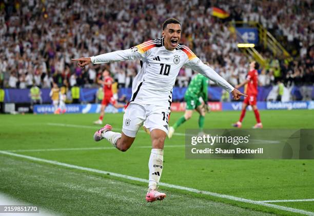 Jamal Musiala of Germany celebrates scoring his team's second goal during the UEFA EURO 2024 round of 16 match between Germany and Denmark at...