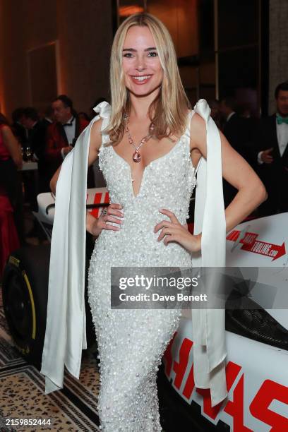 Kimberley Garner attends The Grand Prix Ball 2024 in support of Make-A-Wish at The Peninsula Hotel on July 3, 2024 in London, England.