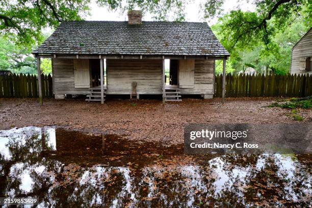 slave hut at the oak alley plantation, vacherie, louisiana - slave quarters stock pictures, royalty-free photos & images