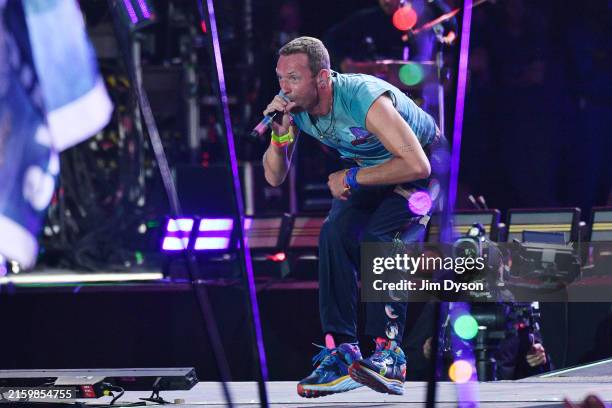 Chris Martin of Coldplay performs on the Pyramid stage during day four of Glastonbury Festival 2024 at Worthy Farm, Pilton on June 29, 2024 in...