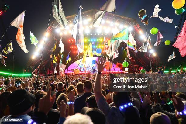 General view of the crowd listening to ColdPlay perform during day four of Glastonbury Festival 2024 at Worthy Farm, Pilton on June 29, 2024 in...