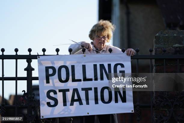 Woman prepares the polling station in the constituency of Richmond and Northallerton as polls open in the General Election on July 4, 2024 in Kirby...
