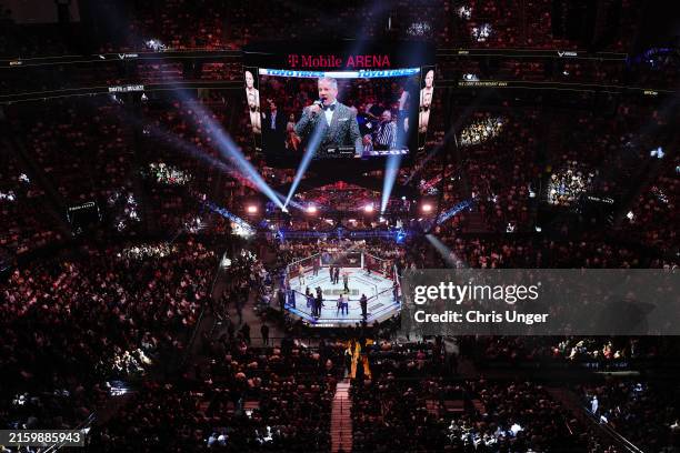 General view of UFC announcer Bruce Buffer introducing the fighters in a light heavyweight fight during the UFC 303 event at T-Mobile Arena on June...