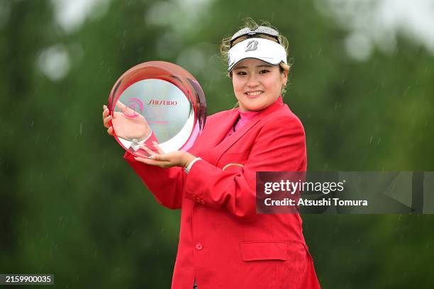 Shiho Kuwaki of Japan poses with the trophy after winning the tournament following the final round of SHISEIDO LADIES OPEN at Totsuka Country Club...