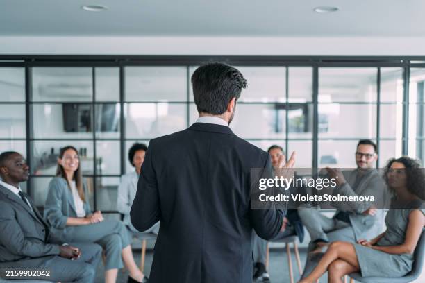 business persons on meeting in the office. - black suit stock pictures, royalty-free photos & images