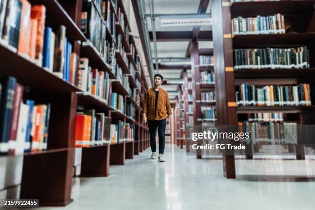 Running Inthe Library 1,467 Mv Library Stock Photos, High-Res Pictures, and Images - Getty Images