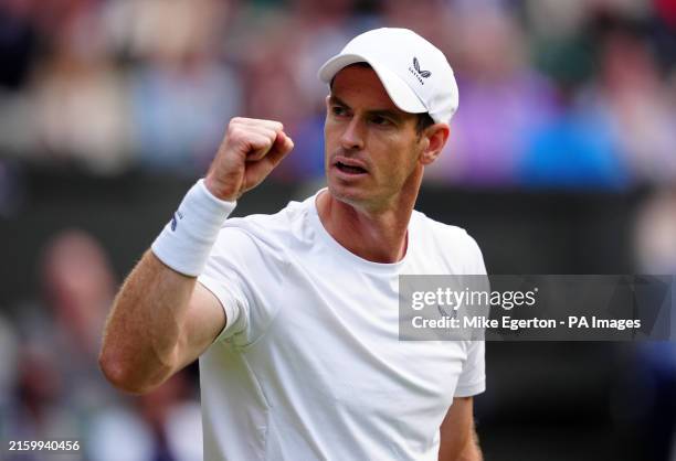 Andy Murray reacts during the gentlemen's doubles match against Rinky Hijikata and John Peers on day four of the 2024 Wimbledon Championships at the...