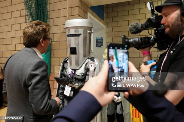 Satirical political character 'Count Binface' speaks to journalists during the count for the Richmond and Northallerton constituency during the UK...