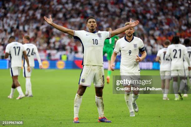 Jude Bellingham of England celebrates scoring his team's first goal during the UEFA EURO 2024 round of 16 match between England and Slovakia at Arena...
