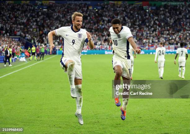 Harry Kane of England celebrates scoring his team's second goal with teammate Jude Bellingham during the UEFA EURO 2024 round of 16 match between...