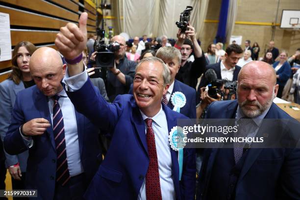 Reform UK leader Nigel Farage celebrates after being elected to become MP for Clacton at the Clacton count centre in Clacton-on-Sea, eastern England,...