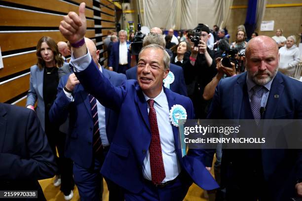 Reform UK leader Nigel Farage reacts after being elected to become MP for Clacton at the Clacton count centre in Clacton-on-Sea, eastern England,...