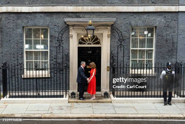 Labour leader and incoming Prime Minister Sir Keir Starmer and wife Victoria, Lady Starmer enter 10 Downing Street following Labour's landslide...