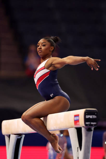 Simone Biles warms up on the balance beam prior to Day Four of the 2024 U.S. Olympic Team Gymnastics Trials at Target Center on June 30, 2024 in...