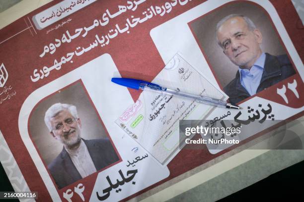 An illustrated image is showing a ballot being pictured on images of Iran's early presidential elections candidates, Saeed Jalili and Masoud...