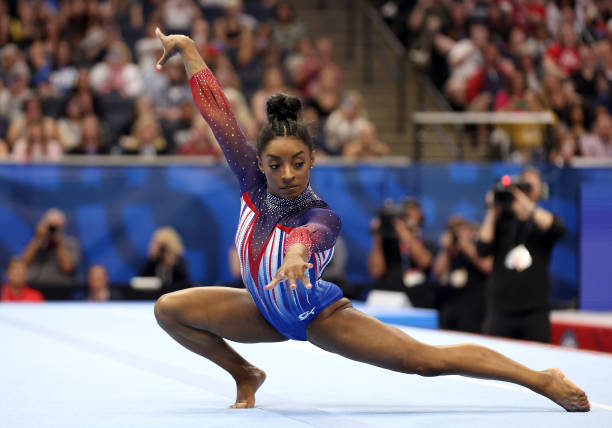 Simone Biles competes in the floor exercise on Day Four of the 2024 U.S. Olympic Team Gymnastics Trials at Target Center on June 30, 2024 in...