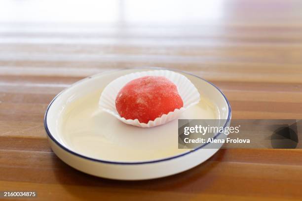 strawberry mochi on a plate in a cafe - filled doughnut stock pictures, royalty-free photos & images