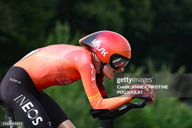 Grenadiers team's Spanish rider Carlos Rodriguez cycles during the 7th stage of the 111th edition of the Tour de France cycling race 3 km individual...