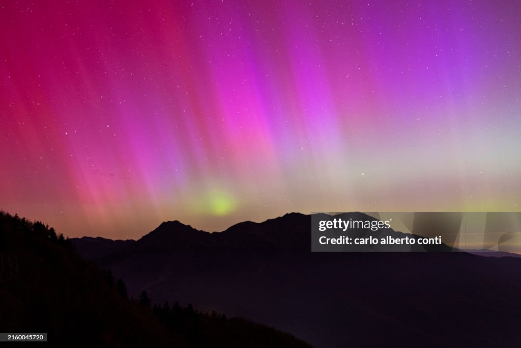 The incredible geomagnetic storm lit up the Italian skies with the dancing Northern Lights, Emilian-Tuscan National Park, Ventasso, Reggio Emilia, Emilia Romagna, Italy, Europe